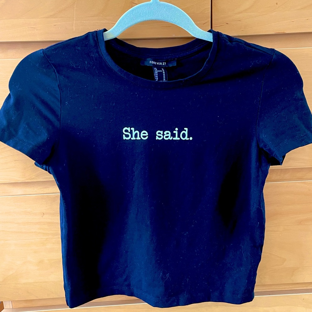 “She Said” black tee top, worn 2 times before , GOOD condition Medium size